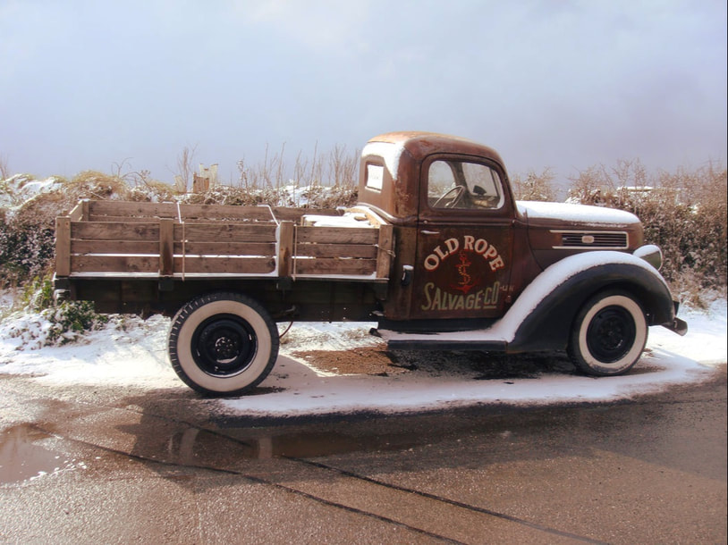 Old Rope Salvage 1941 Ford Truck in the snow