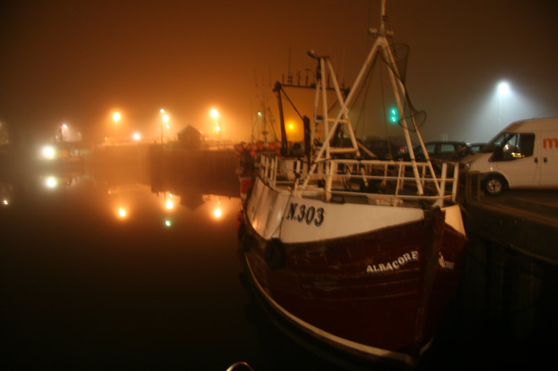 Decommissioned fishing trawler Albacore N303 in Padstow harbour at night