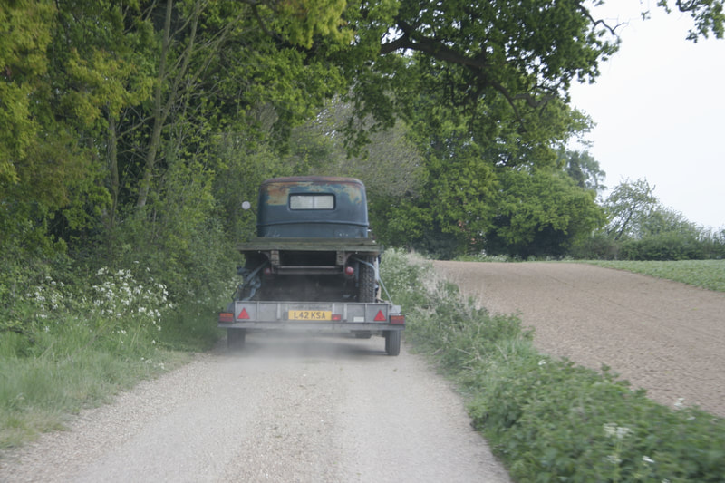1941 Ford Truck on a trailer on a Kent country lane