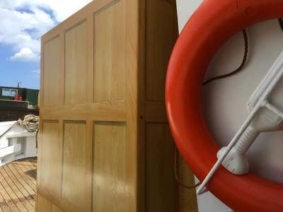 Woodgrain painting effect on boat wheelhouse