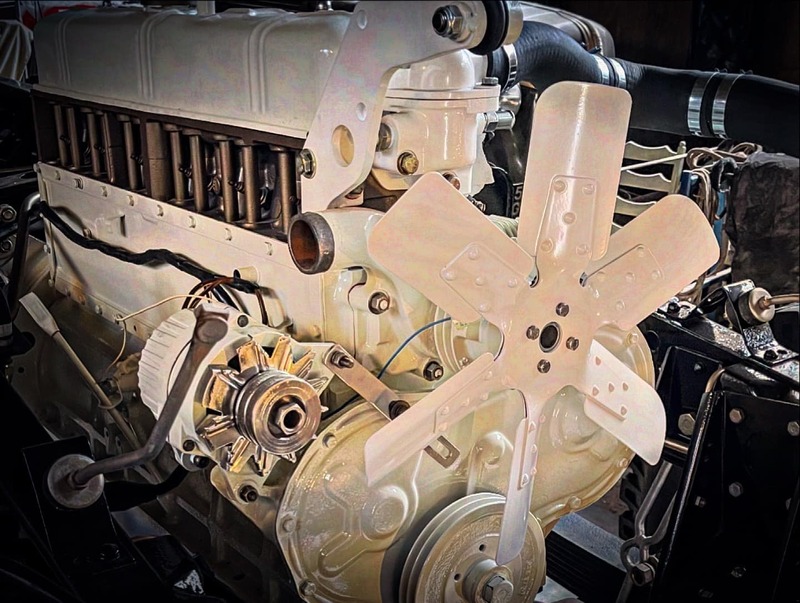 Bedford truck engine restored in white paint
