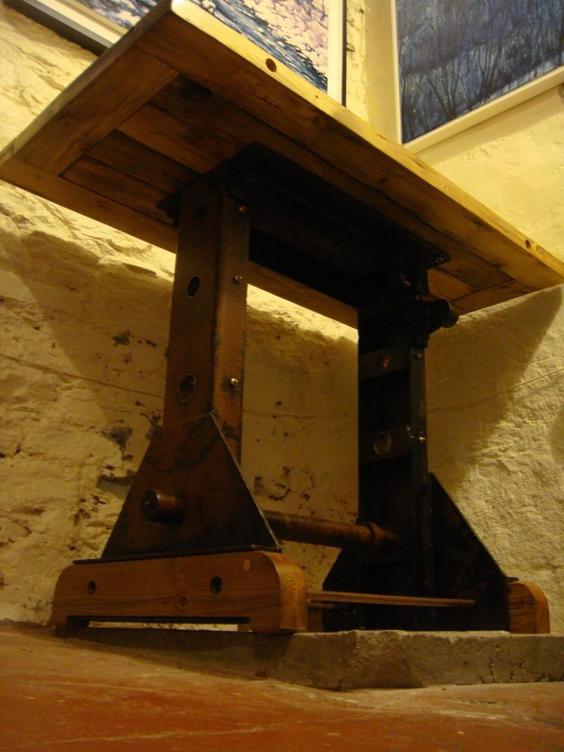 Old metal ship winch upcycled into a table