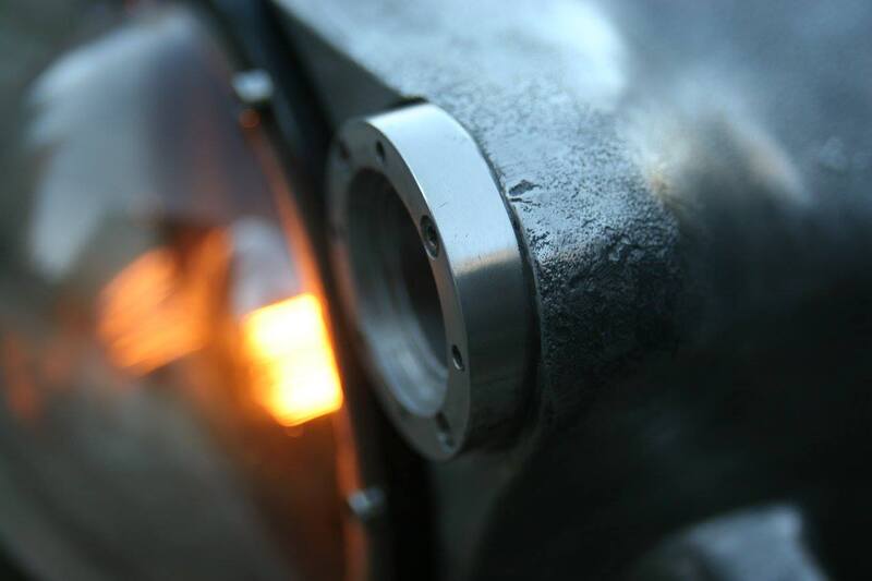 Large metal submersible camera upcycled into a desk lamp