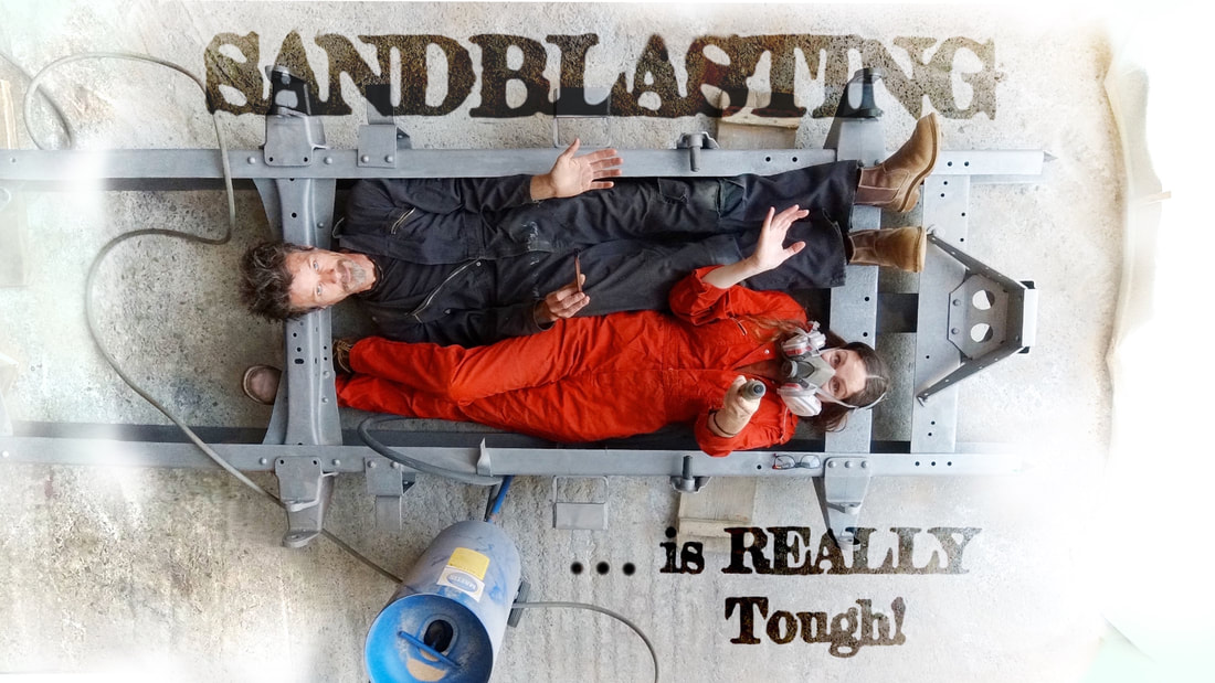 Couple sandblasting a chassis frame