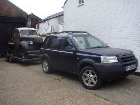 Freelander towing a vintage Ford truck