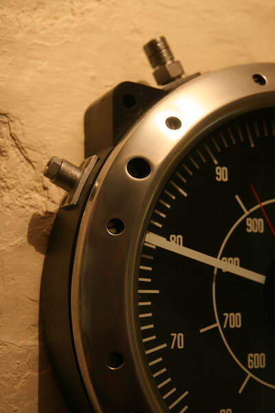 Upcycled vintage Submarine Depth Gauge becomes a wall clock